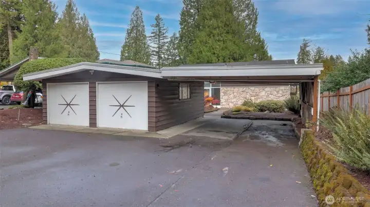 Room for everyone — two-car garage and two-car carport ideal for family and guests