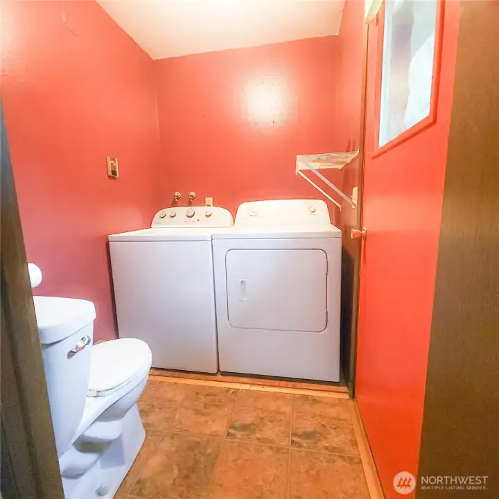 Laundry room with half bath