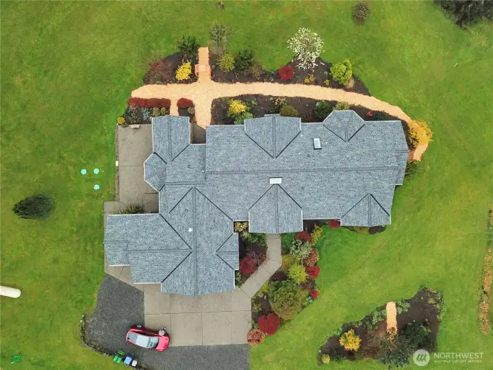 Aerial view of expansive 172,933 sq ft lot with sprawling rambler layout. Aerial view of expansive 172,933 sq ft lot with sprawling rambler layout.