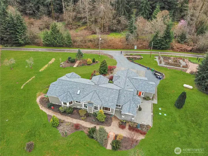 Aerial view of expansive 172,933 sq ft lot with sprawling rambler layout.