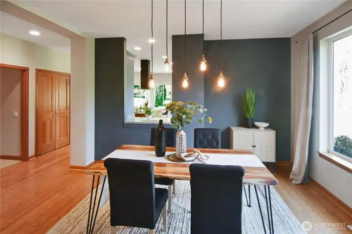 Dining link to the kitchen. Note the large windows letting in so much natural light.