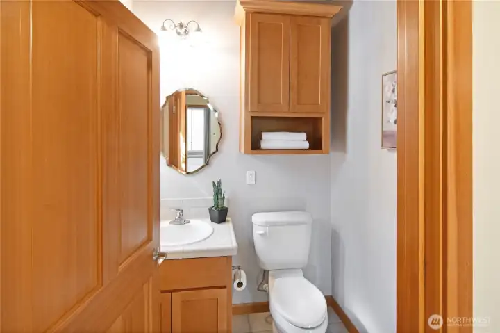 Convenient powder room with clean finishes, perfectly positioned on the main level.