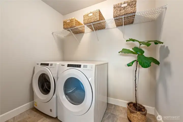 Laundry room is to the immediate right of the common bath.