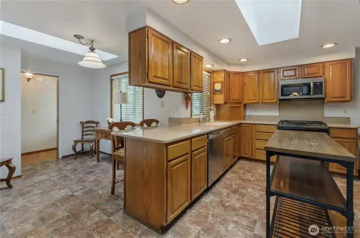 Fresh paint in this modernized kitchen with tons of natural light