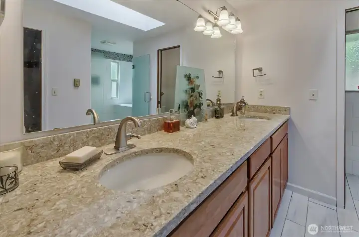 Granite counters  and TWO showers in here!
