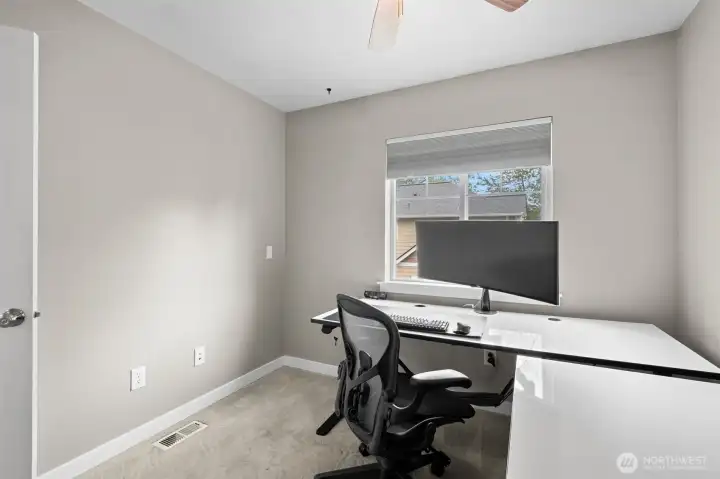 A ceiling fan is included in each bedroom.