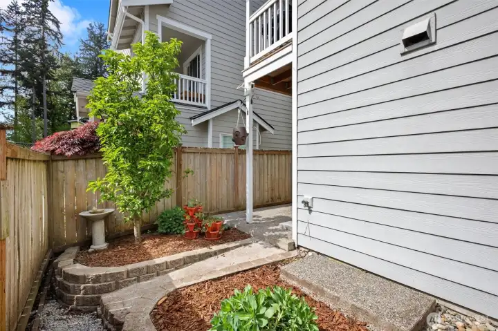 This home offers a RARE fenced-in yard with low maintenance flower beds and patio!