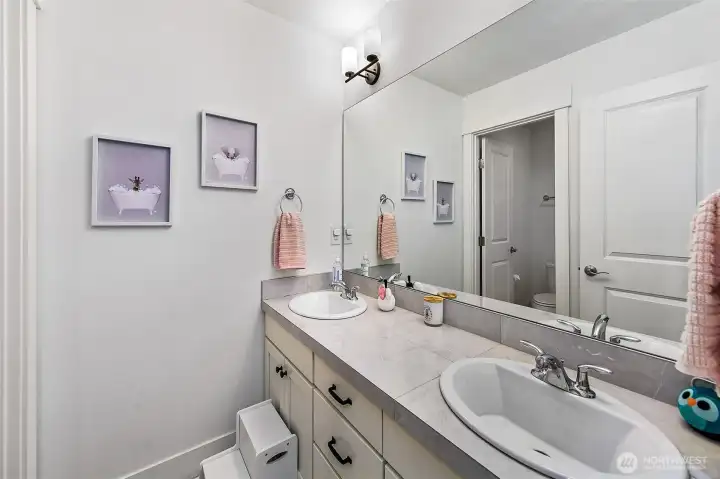 Guest full bathroom on upper level