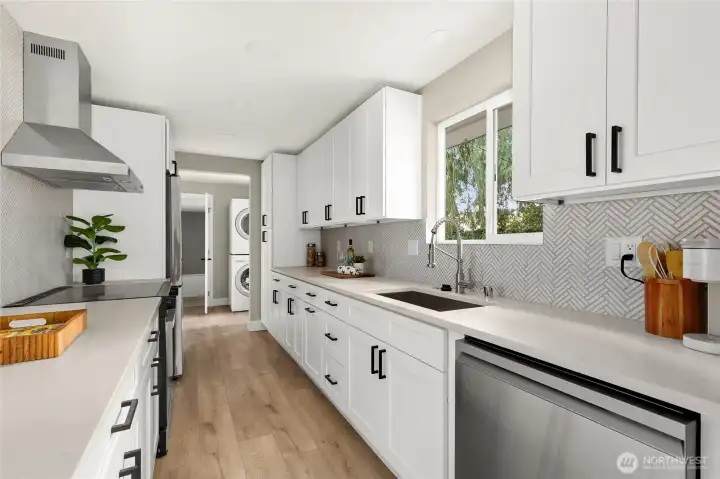 Expansive kitchen with loads of storage.