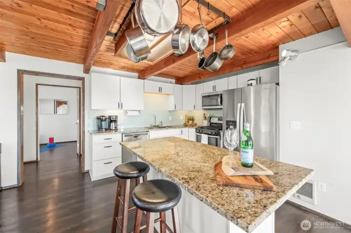 Thoughtfully designed layout connects the kitchen to the private bedroom wing, creating an easy flow between gathering spaces and peaceful retreats. Thoughtfully designed layout connects the kitchen to the private bedroom wing, creating an easy flow between gathering spaces and peaceful retreats.