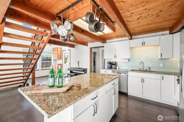 Open sightlines, soaring ceilings & an airy staircase create a welcoming lakehouse feel from the moment you step through the front door. Open sightlines, soaring ceilings & an airy staircase create a welcoming lakehouse feel from the moment you step through the front door.