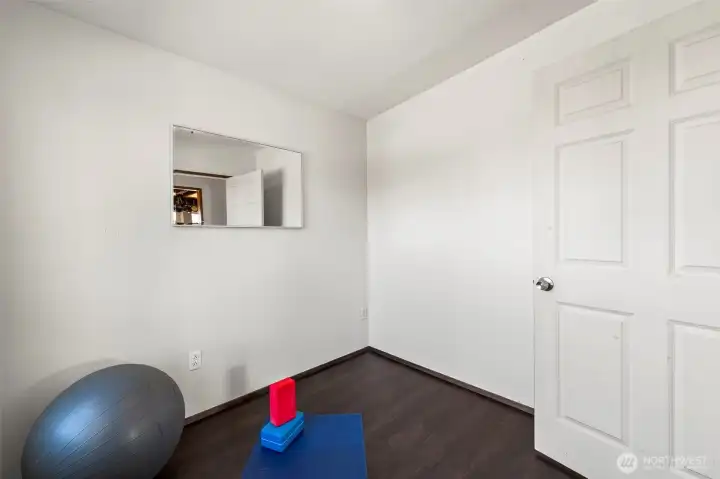 Bright and versatile secondary bedroom on the main floor offering comfortable accommodations for guests, office space or flexible everyday living. Bright and versatile secondary bedroom on the main floor offering comfortable accommodations for guests, office space or flexible everyday living.
