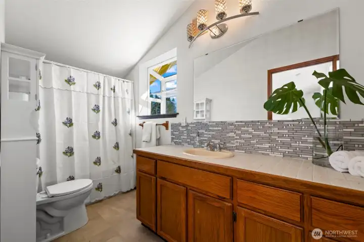 Full loft bathroom offers added comfort and privacy for guests, extended stays or flexible multi-level living. Full loft bathroom offers added comfort and privacy for guests, extended stays or flexible multi-level living.