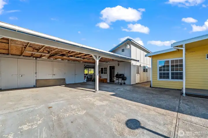 Versatile detached studio retreat with covered parking, storage space, kitchenette, 3/4 bath, laundry hookups & flexible room for guests, rental income or multi-generational living. Versatile detached studio retreat with covered parking, storage space, kitchenette, 3/4 bath, laundry hookups & flexible room for guests, rental income or multi-generational living.