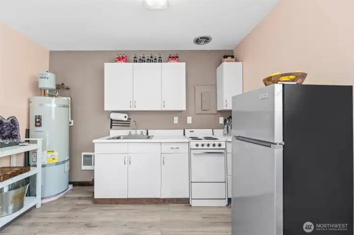 Functional kitchenette adds convenience and flexibility to the detached studio, ideal for guests, extended stays or vacation rental opportunities. Functional kitchenette adds convenience and flexibility to the detached studio, ideal for guests, extended stays or vacation rental opportunities.