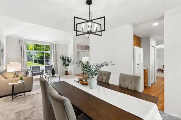 Dining room toward living room, glimpse of kitchen