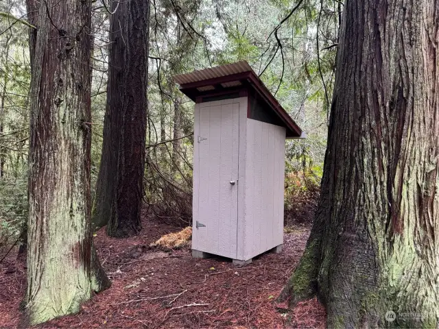 Small shed was used for portable outhouse during camping. Can stay or be removed.