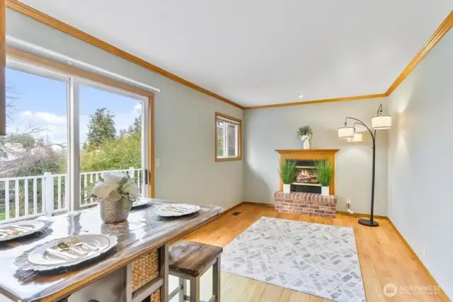 Family room with fireplace and large window!