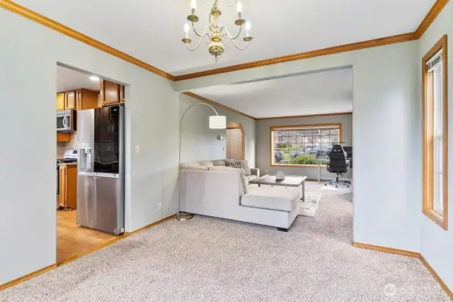Living room flows into the formal dining area!