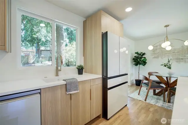 Samsung Bespoke white glass appliances.
