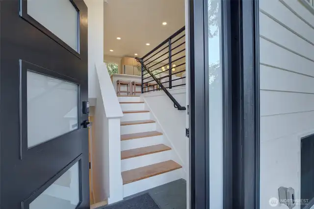Welcome! New front door with electronic keypad and key for access and security.