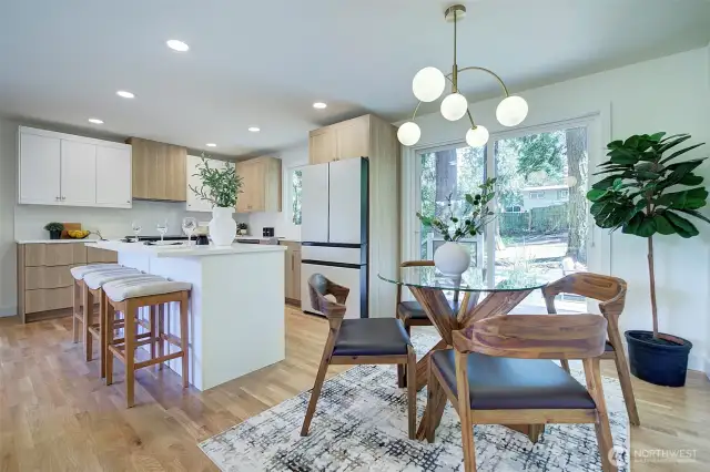 Original white oak hardwood floors have been re-finished and the kitchen has new white oak floors installed to match!