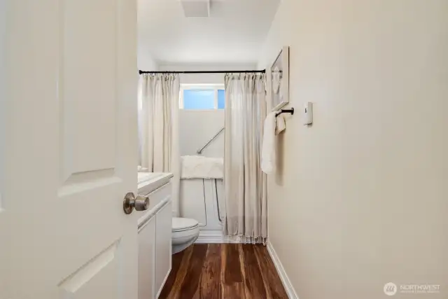 Upper unit with walk in tub.