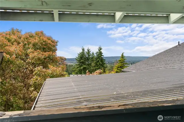 Deck off primary bedroom with a view