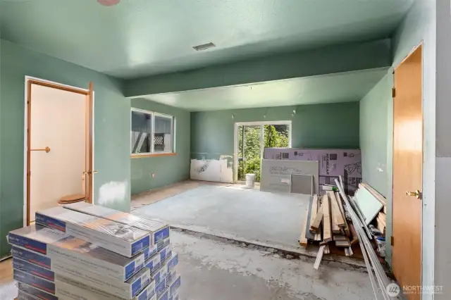 Downstairs family room with half bath and wet bar
