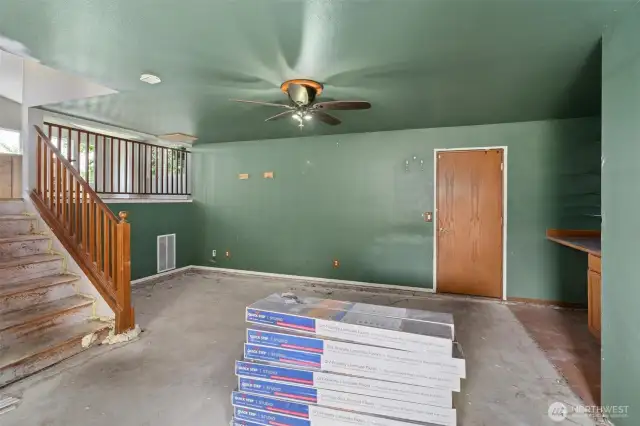 attached garage access and wet bar on the right