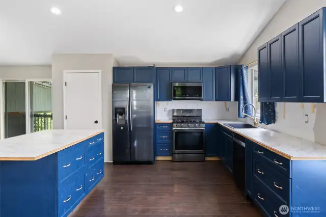 Walk in pantry next to fridge