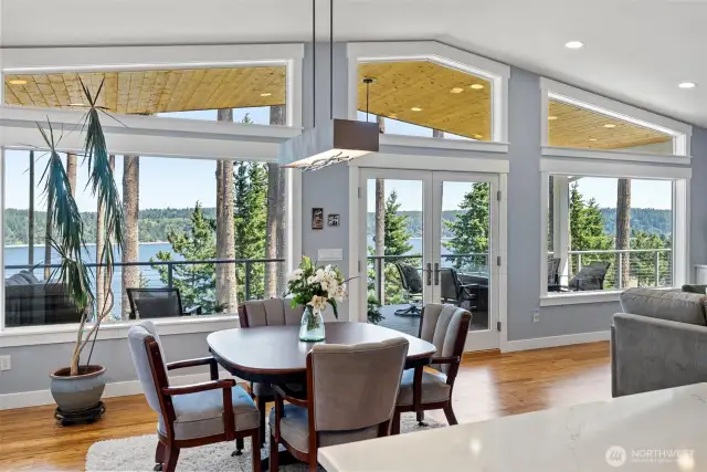 Wall of windows that open to your large deck