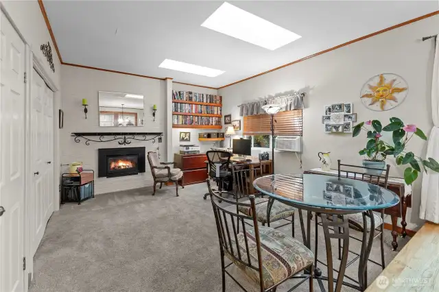 Family room with gas fireplace and 2 skylights