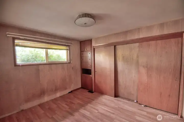 Bedroom one is large with lots of closet space.