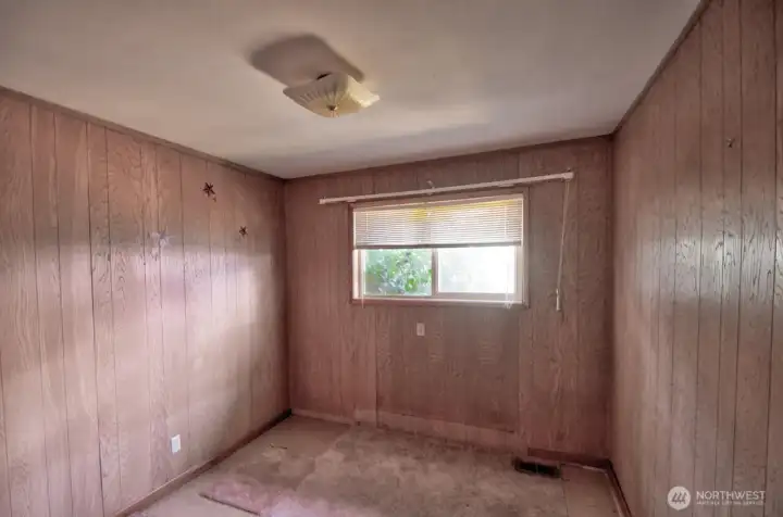 Bedroom 2 has lots of natural liht.