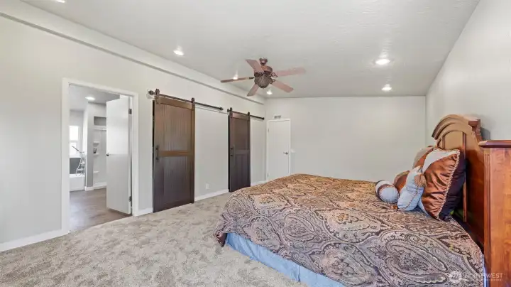 Spacious primary retreat w/ brand new barn doors