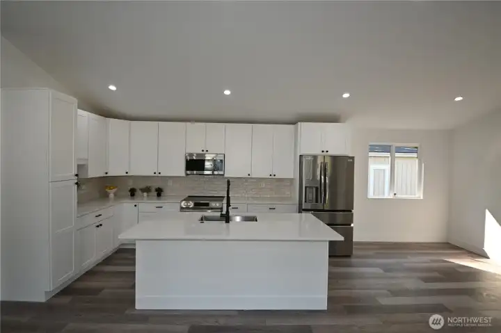Space for dining table + casual bar seating.