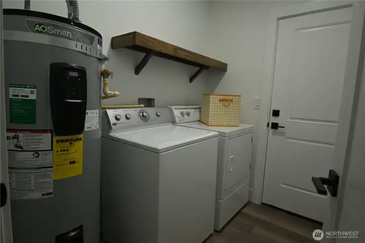 Utility room with exterior access.