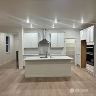 Gourmet kitchen with full-height backsplash!