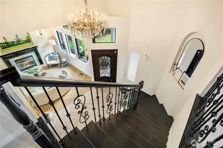 View from the second-floor landing overlooking the staircase and main level