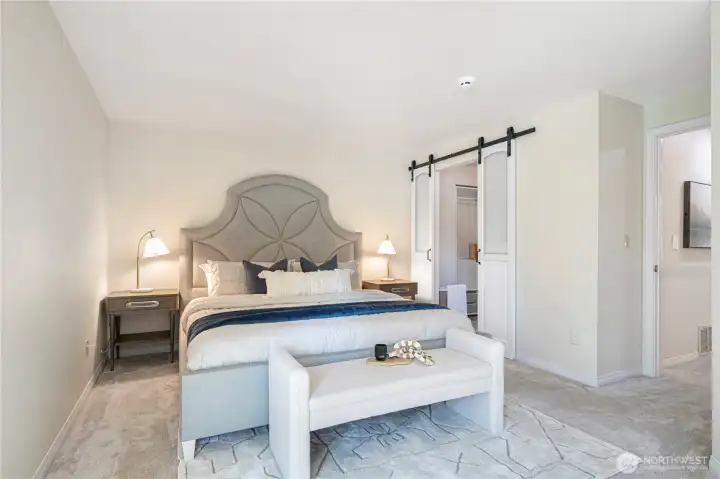 Master bedroom with barn door