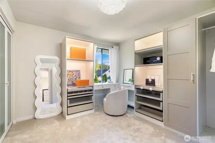 Custom dressing room includes customized closet and a makeup suite, smartly controlled by Alexa