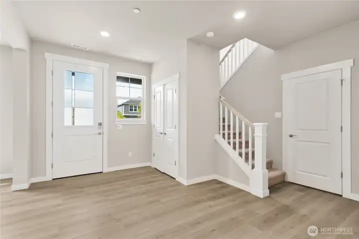 Entry flooded with light. Photo's are for representational purposes only. Colors and finishes may differ.