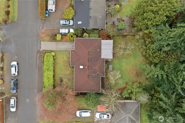 this pic shows the parking options as well as the privacy of the yard surrounding the home.