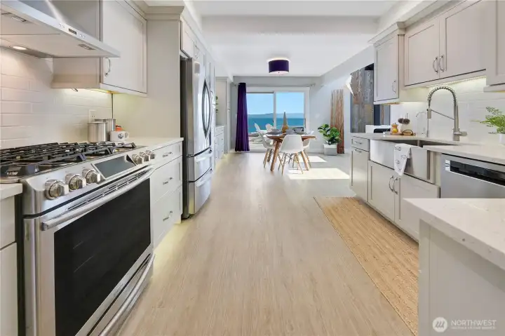 Kitchen. Door behind leads to small pantry & main floor full bath also off bedroom