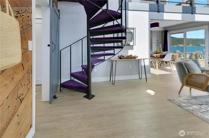 Living room to main floor bedroom.