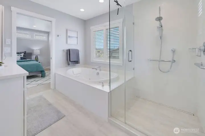 Main floor bath w/ radiant floor heat, jetted tub & walk-in shower