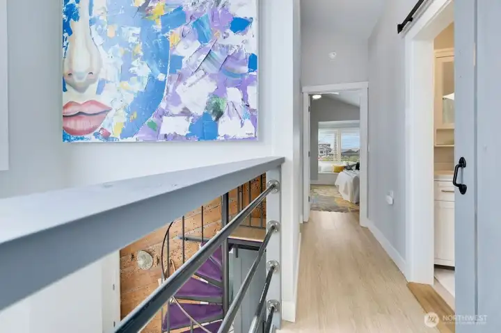 Upstairs to primary bedroom, 3/4 bath & open loft w/ views