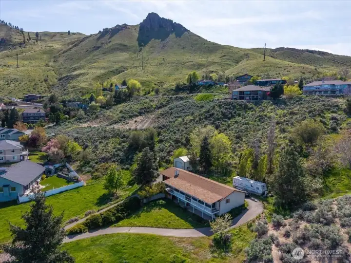 Welcome to 1531 Millerdale. 1.89 acres of potential!