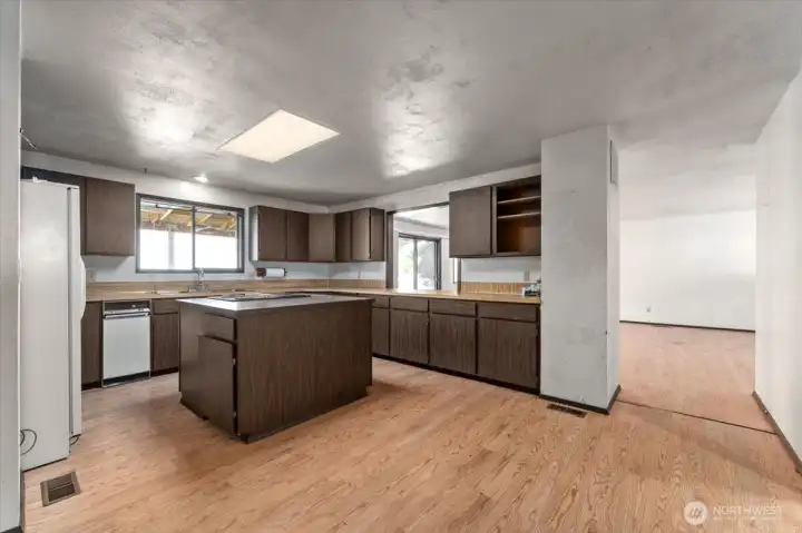 Kitchen and view into family room.